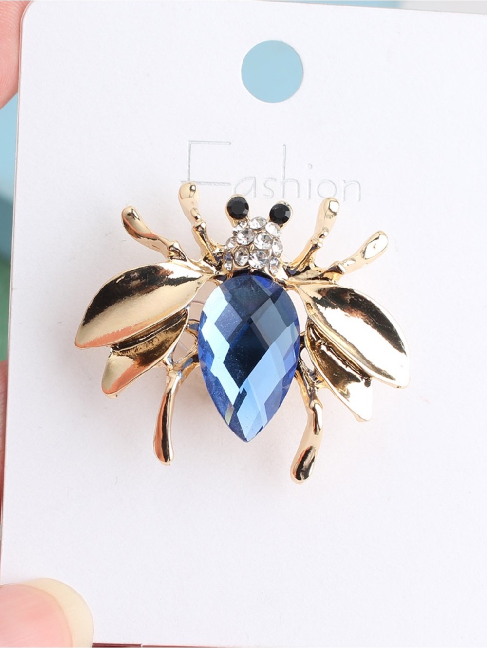 Gold Bee Brooch with Blue Crystal